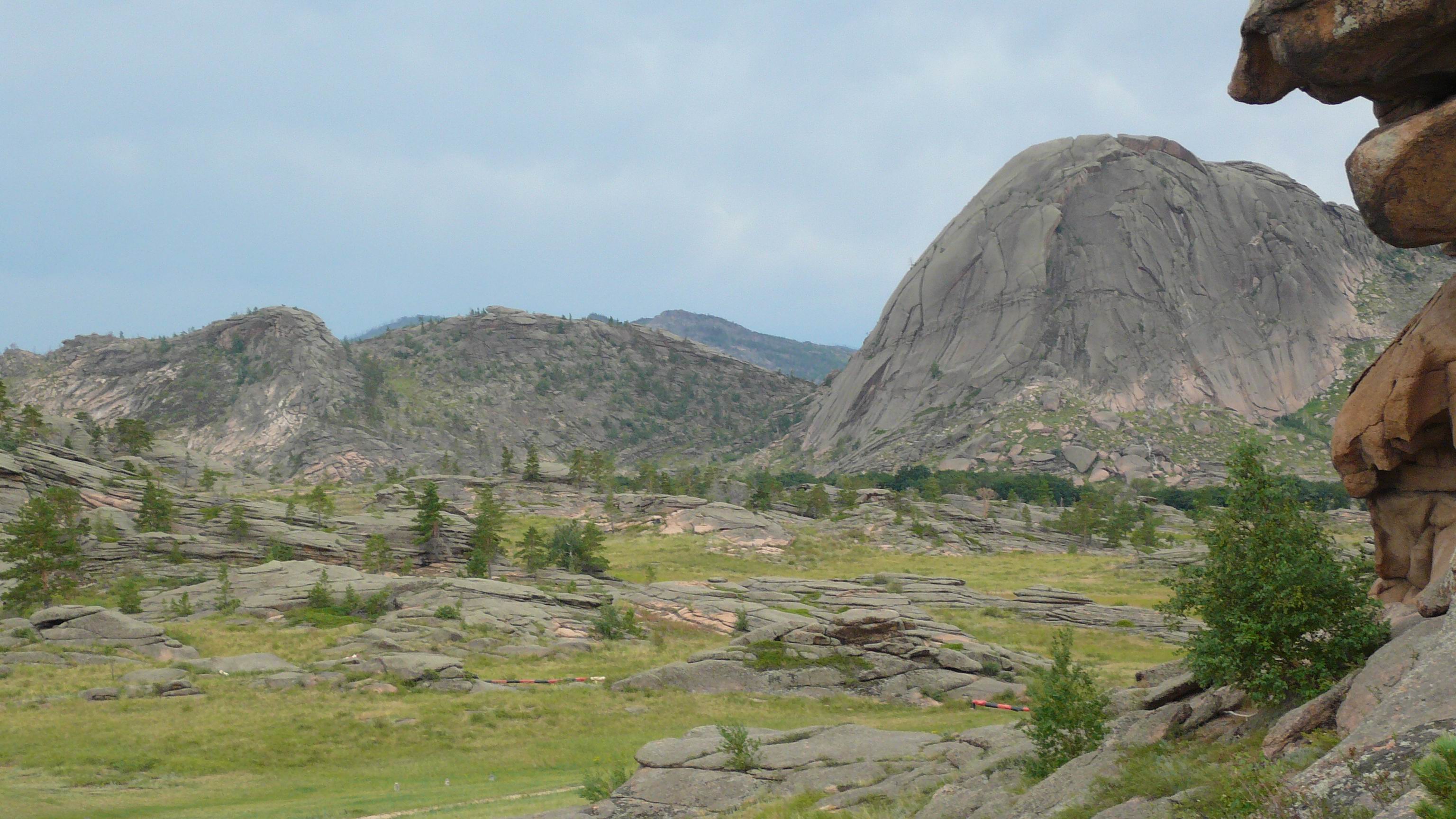 Rocky granite peaks and grassland in Bayanaul National Park, Kazakhstan