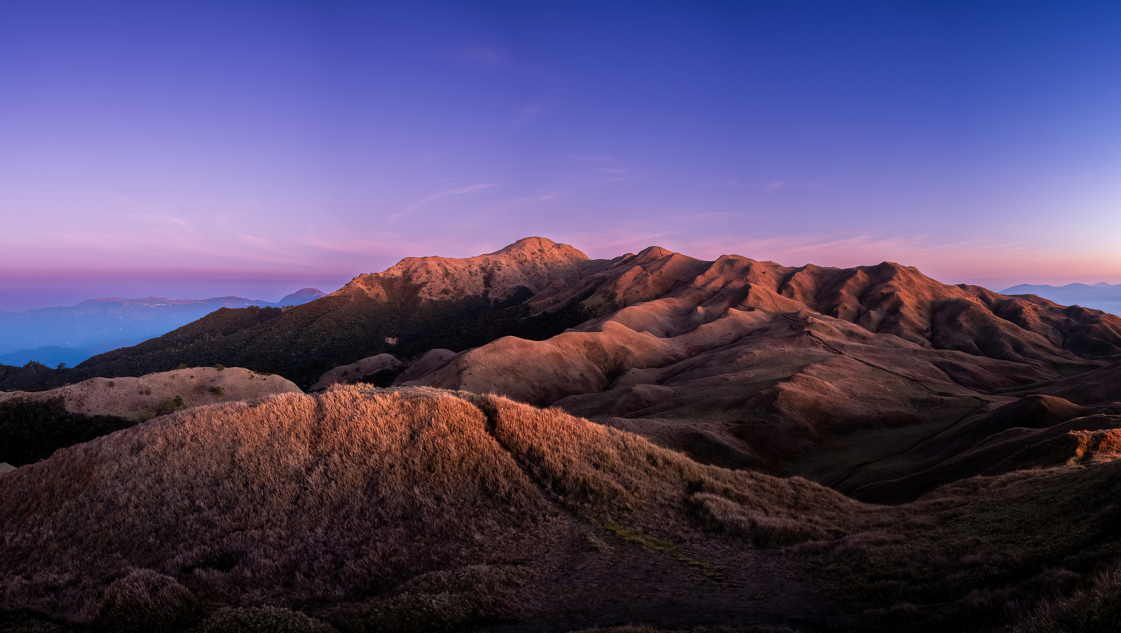 Philippines Mountains and Volcanoes: Climb 9 Distinct Peaks 6 Mount Pulag summit grassland at sunrise