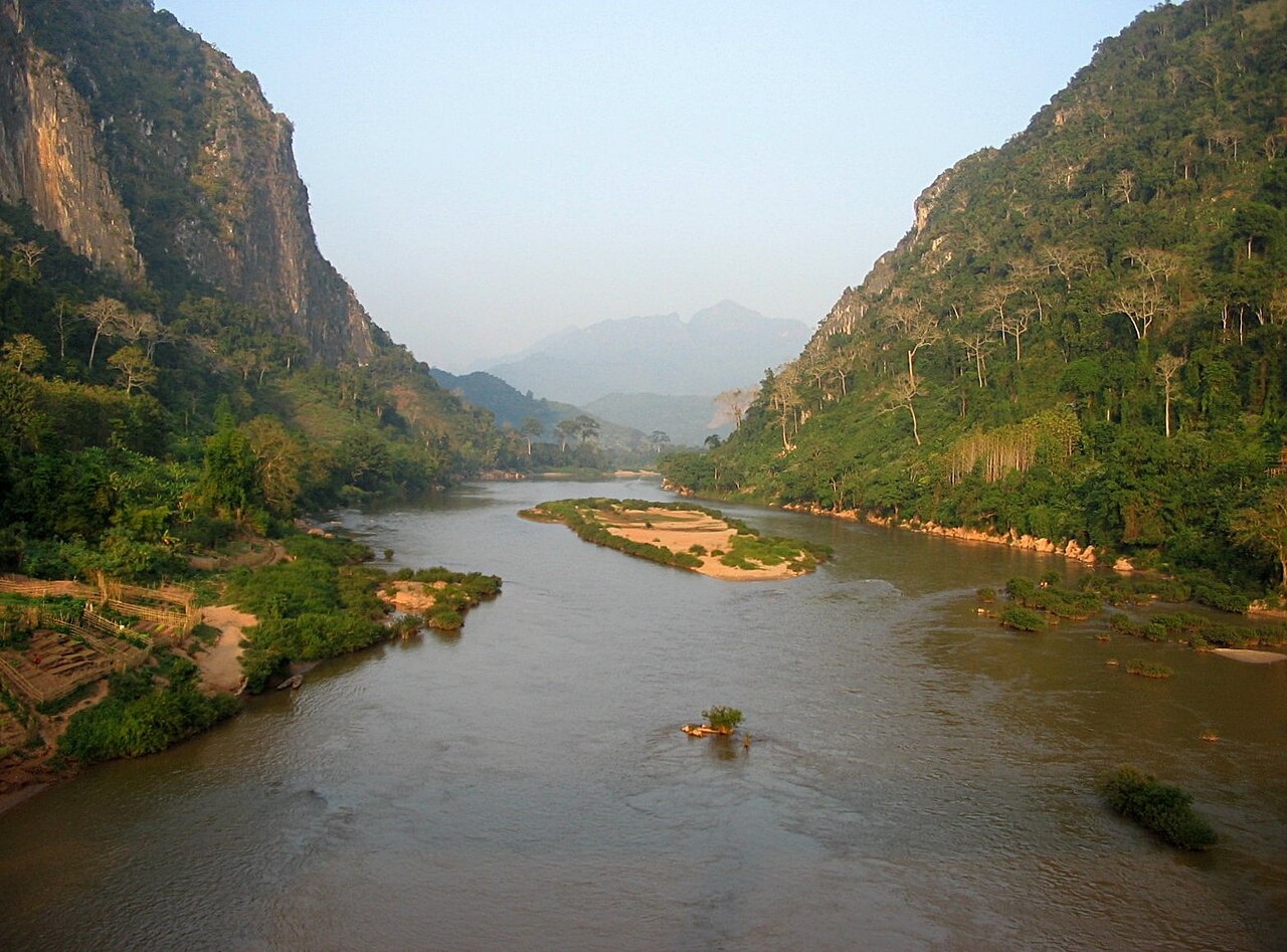 Nam Ou river winding through limestone cliffs near Muang Khua, with sandy river bars