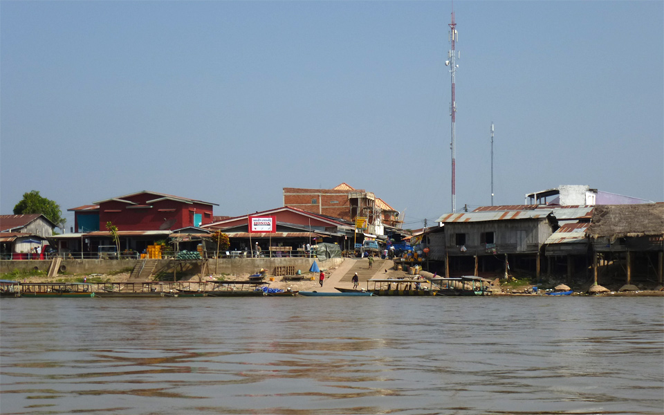 Riverfront buildings and boat landing at Ban Nakasang on the Mekong, gateway to the 4000 Islands