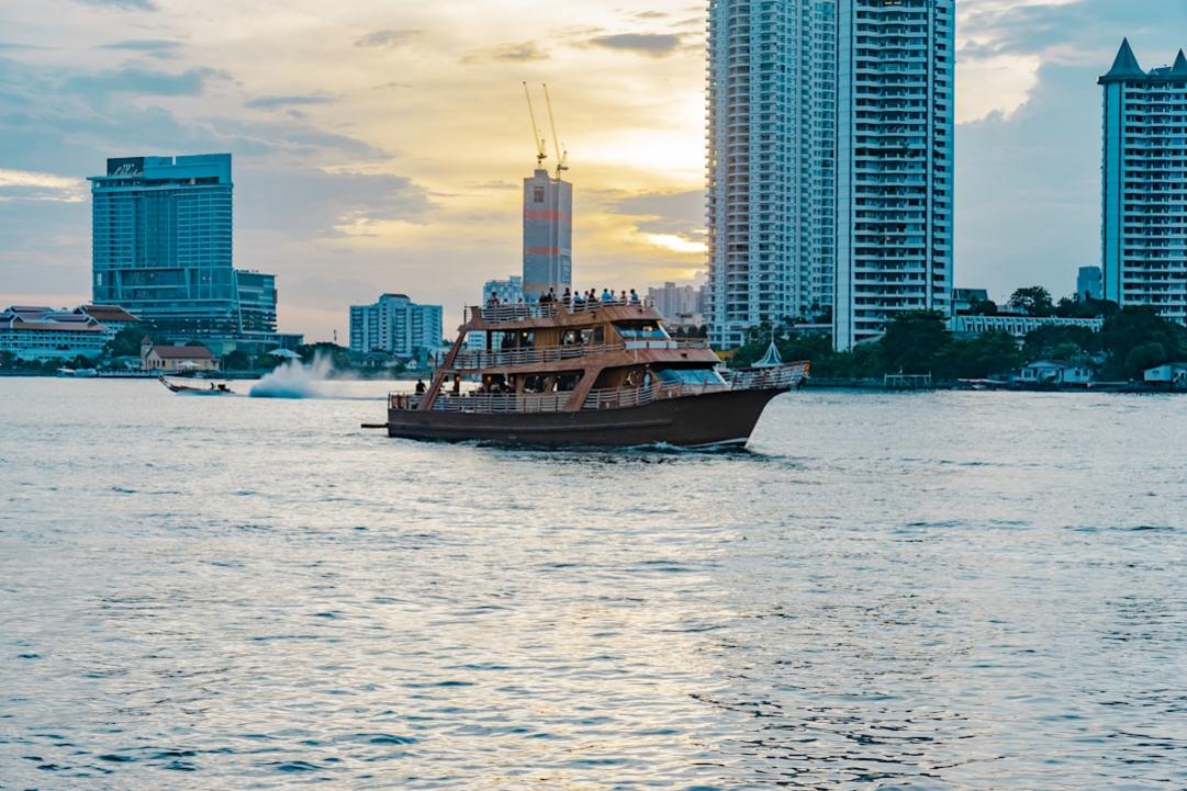 Experience Thailand's Vibrant Culture from Bangkok to Koh Phangan 11 Thailand temple bangkok Boat or ship at Chao Phraya River