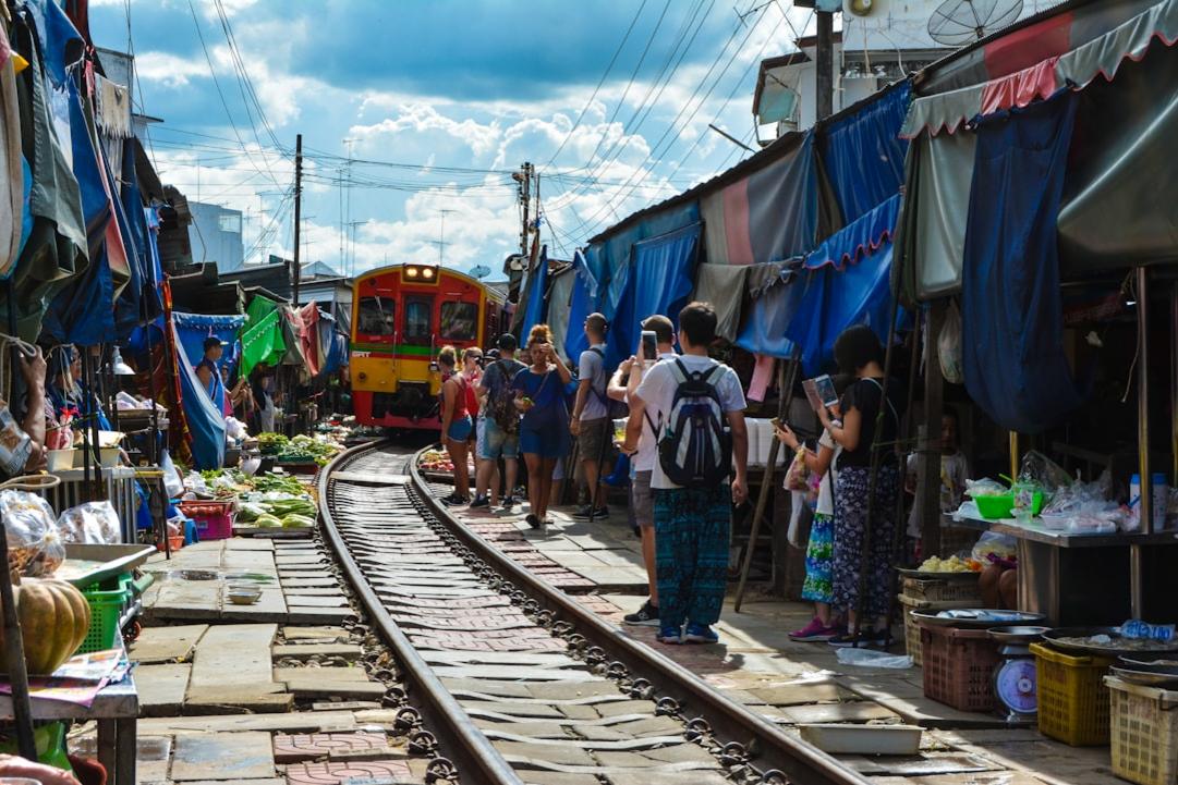 Experience Thailand's Vibrant Culture from Bangkok to Koh Phangan 19 Thailand temple bangkok Maeklong Markert SamutSongkhram Thailand